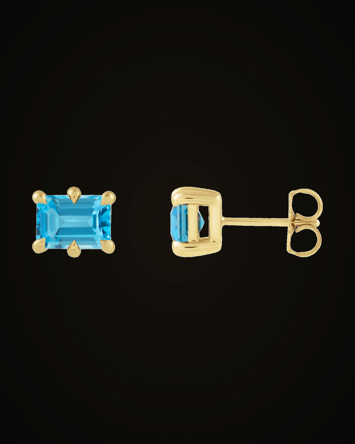 Natural Swiss Blue Topaz Stud Earrings — 14K Yellow Gold · 7 x 5 mm