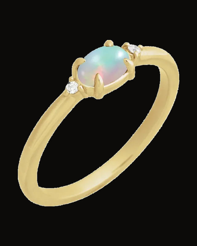 0.03 CTW Natural Ethiopian Opal And 0.03 CTW Natural Diamond Claw-Prong Cabochon Ring — 14K Yellow Gold · 10.9 x 4.6 mm